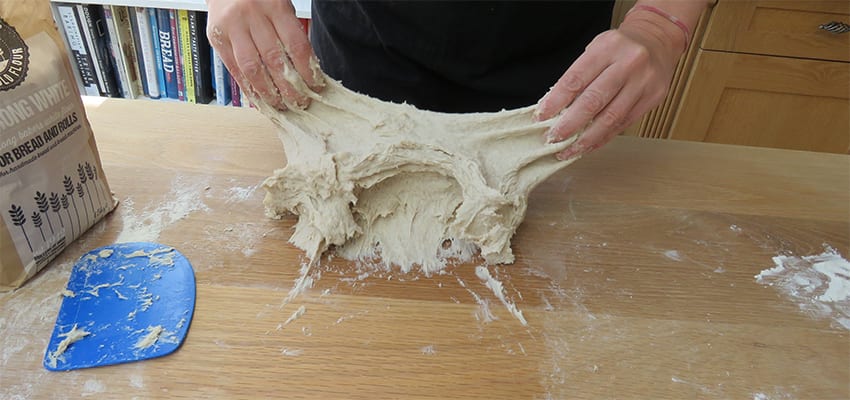 Stretching and knocking back the bread dough