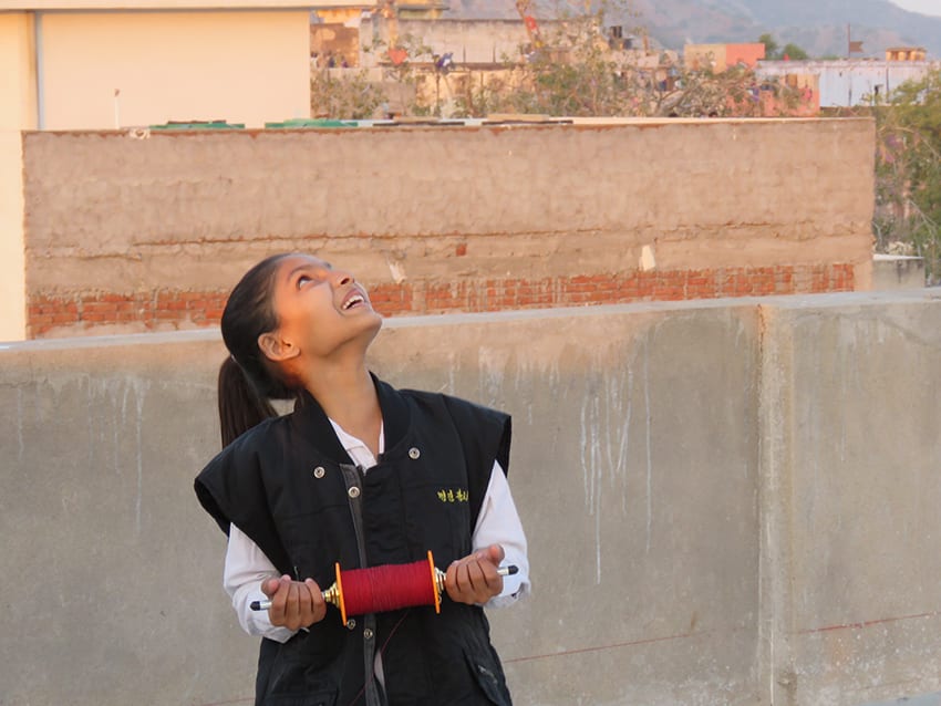 The girls flying kites at the Kite Festival