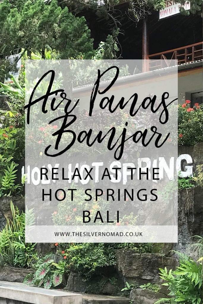 Air Panas Banjar relax at the Hot Springs Bali with stone-carved nagas (mythical dragons) spouting sulphur water