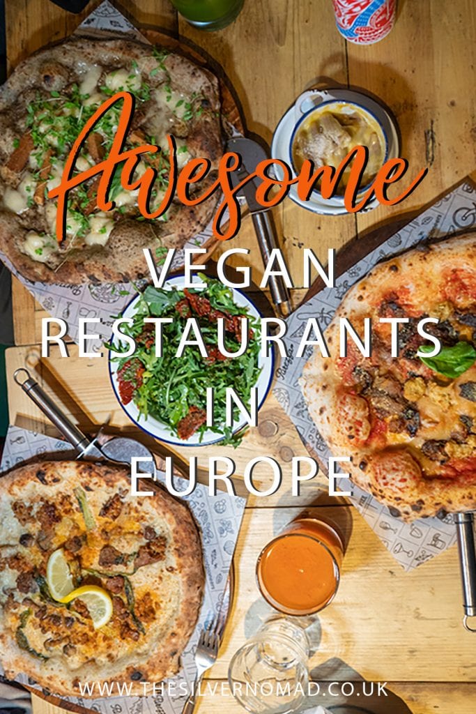 three vegan pizzas with rocket salad Writing "Awesome vegan restaurants in Europe" superimposed on top