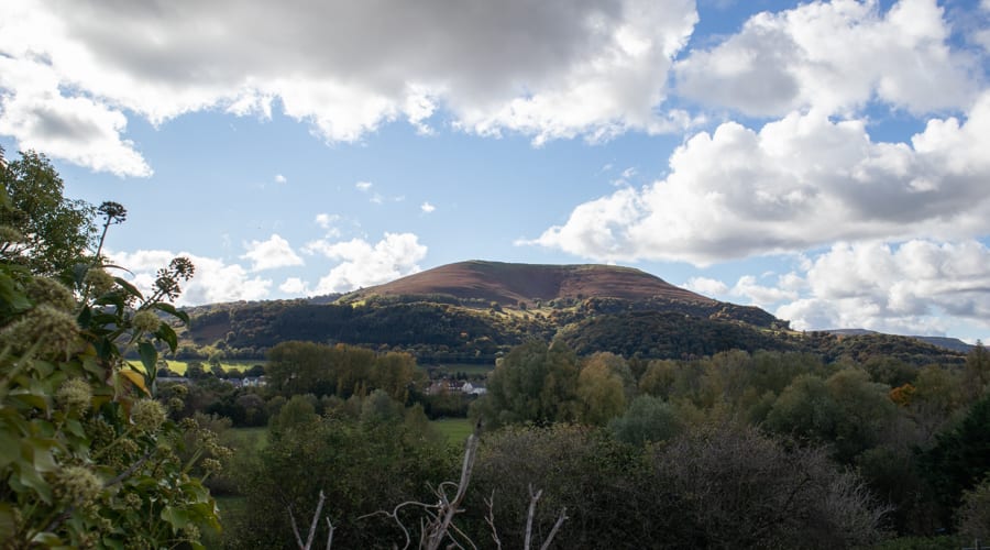 Blorenge mountain in the sunlight with blue skies