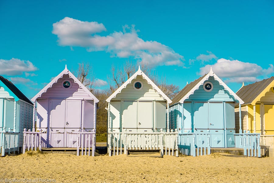 pastel painted beach huts on Mersea Island