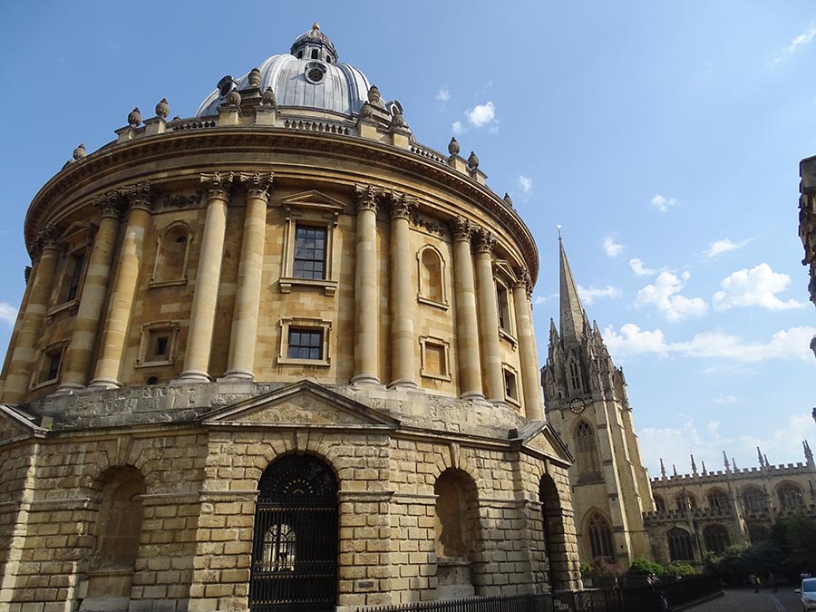 the round building of Radcliffe Camera with bricks to the lower part and pillared upper area