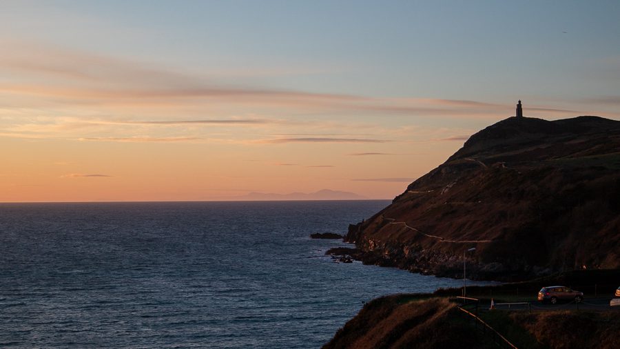 Bradda Head at Sunset with the Mountains of Morne in the distance