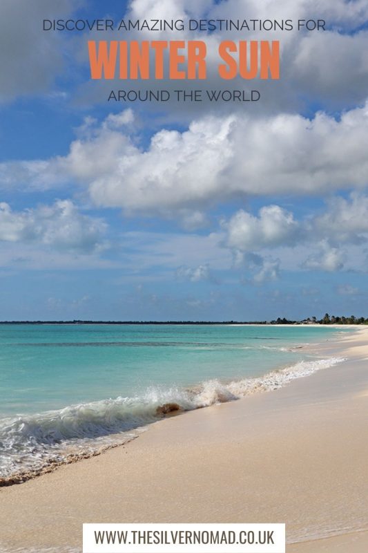 Beach with turquoise seas with Amazing Destinations for Discover Amazing Destination for Winter Sun around the World written on top