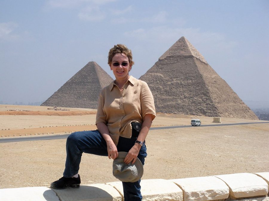 Talek from Travels with Talek with two pyramids behind her