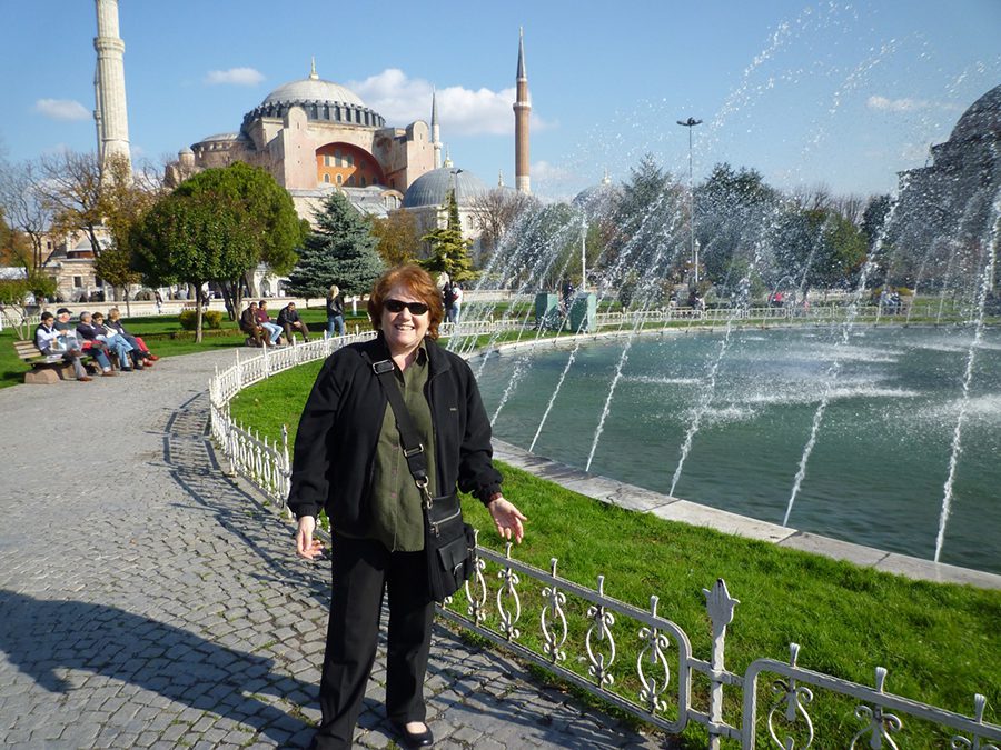 Leyla from Women on the Road in Istanbul with the Blue Mosque behind her