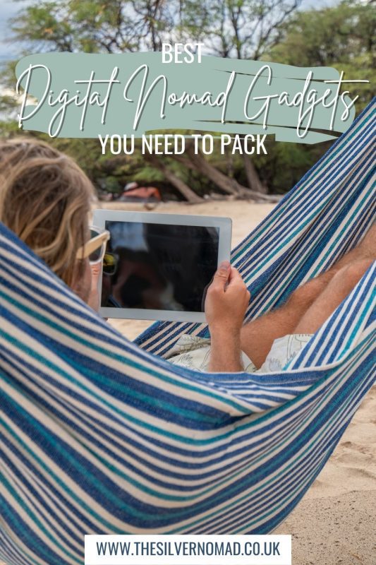 Images of a person lying in a blue stripped hammock holding an ipad with some trees in the background. The words "Best Digital Nomad Gadgets you need to pack" superimposed on top