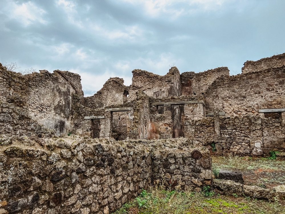 Archaeological ruins of Pompeii showing walls, doorways and windows