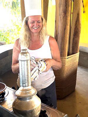 filling the pittu steamer with the mixture