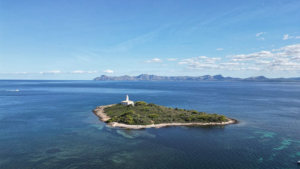 Formentor lighthouse on an island surrounded by sea