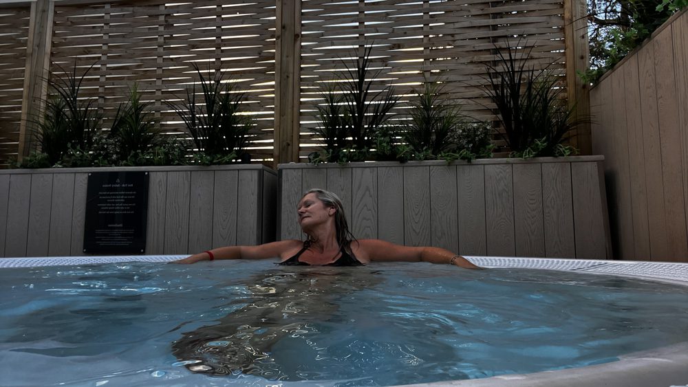 Larch leaning back relaxing in the jacuzzi