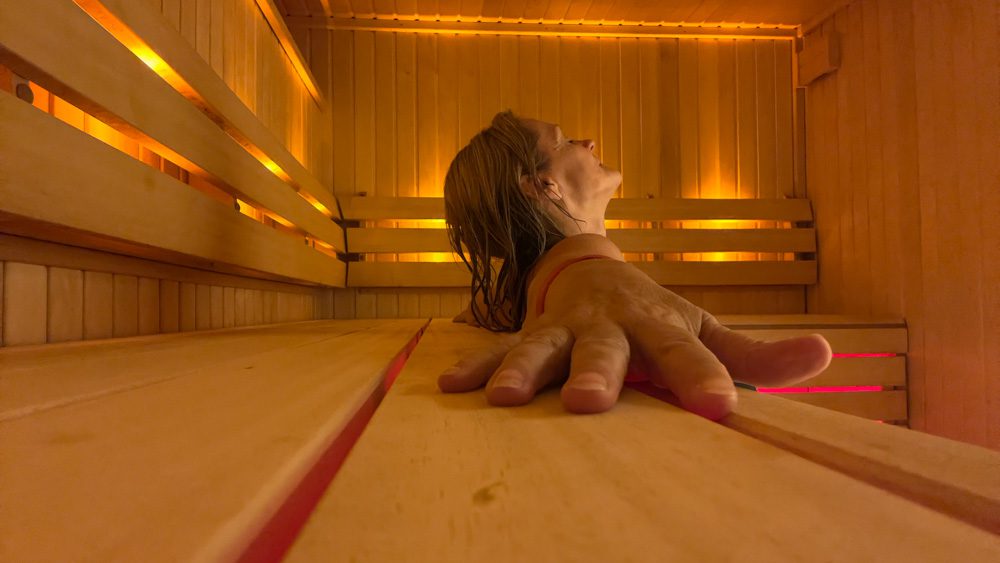 Larch taking the steam in the wood lined sauna