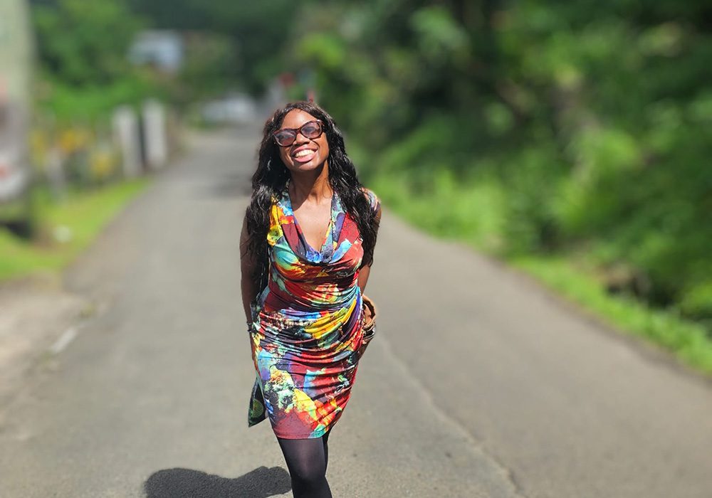 Latoya in a colourgul short dress 