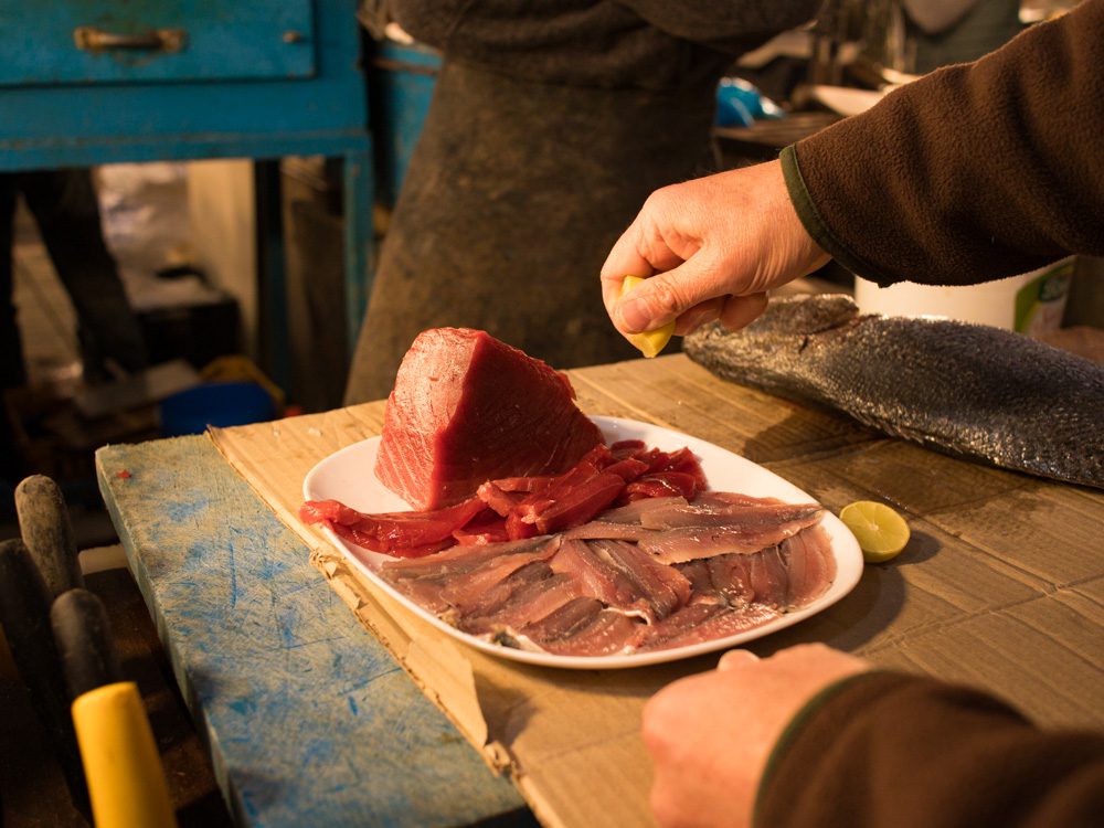 thin slices of red raw tuna and mackerel sushi in the Central Market