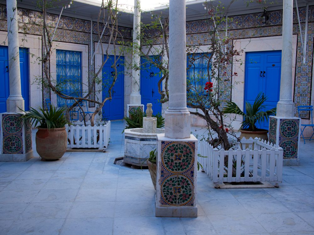 Blue doors to the rooms at the Hotel Dar Said