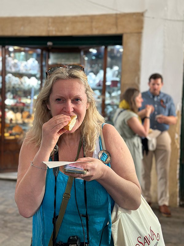 Larch in a turquoise dress trying out the Fricasee