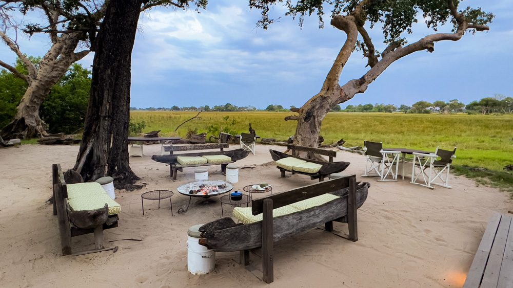 The Boma at Xaranna Camp with benches around a fire pit