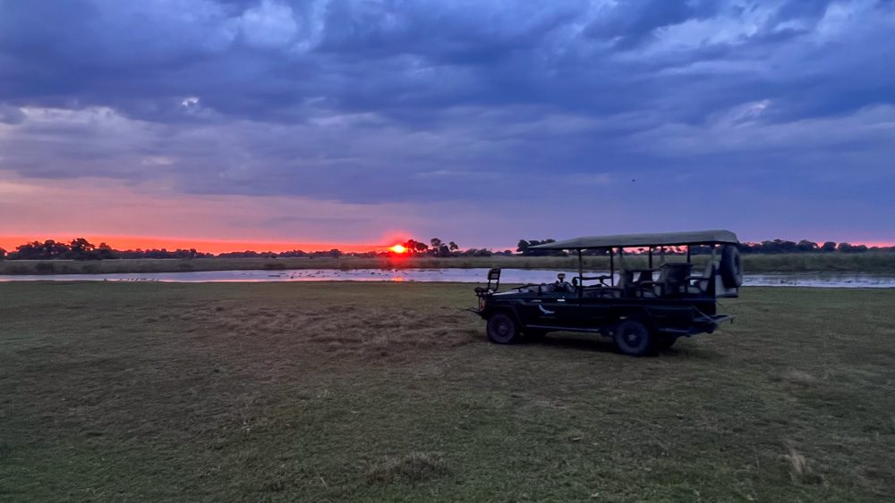 green landcruiser at sunset