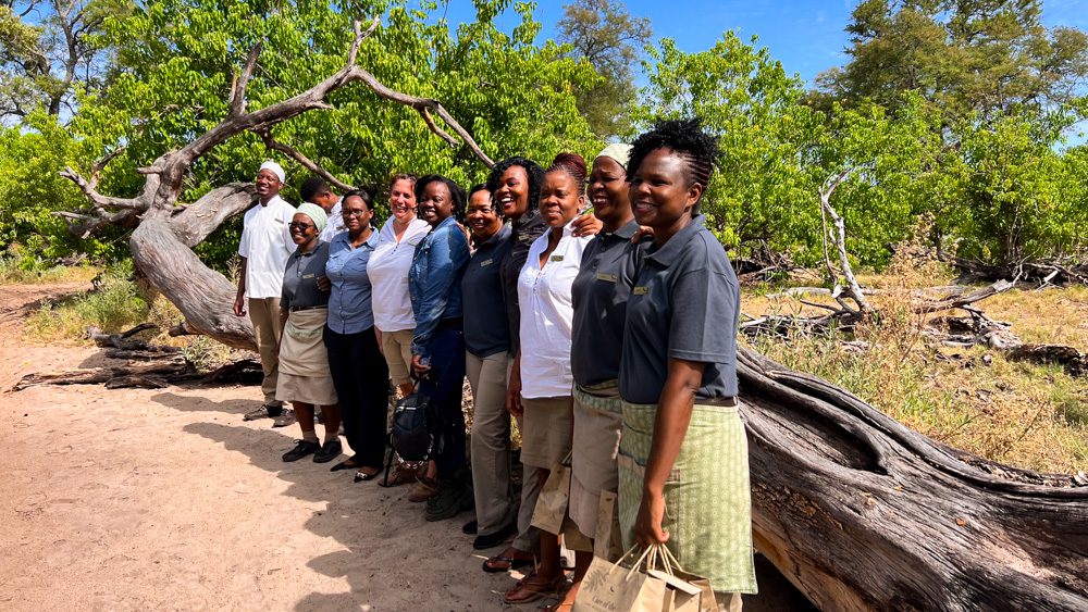 group of people with blue or white tops