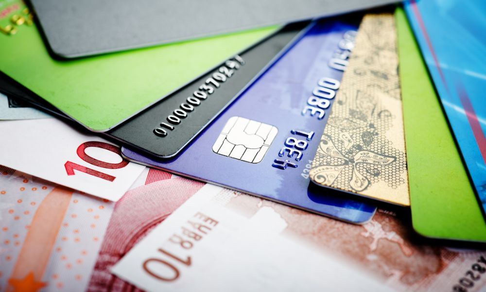 a selection of credit cards and 10 euro notes