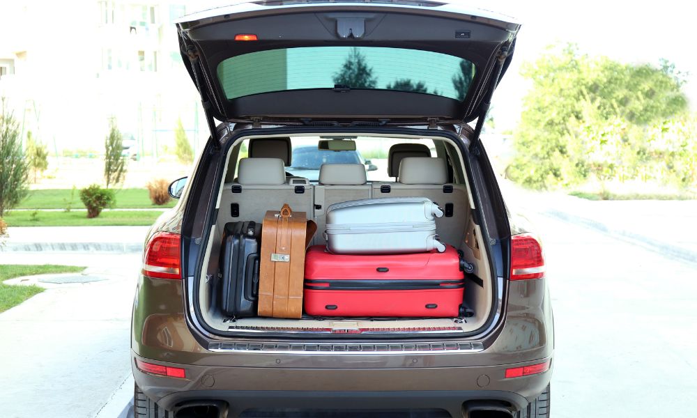 boot of car stuffed with luggage